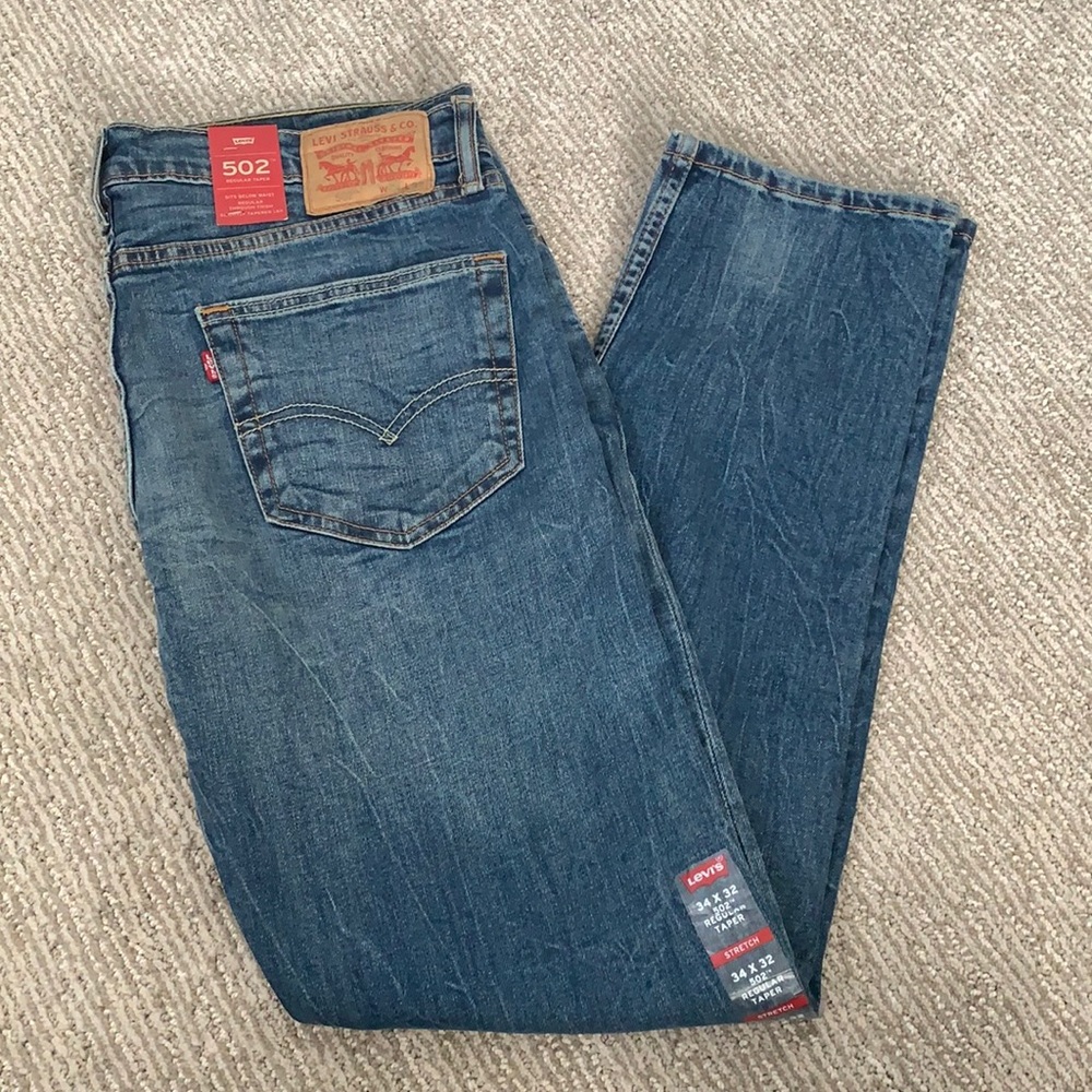 Levi's 502. 34x32. NWT. Light blue. Stone washed. Regular taper.